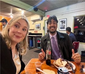 Abby Powell dines with another student in Austin, Texas.